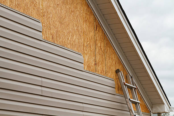 Professional Emergency Siding Repair technician working in Danville, IL